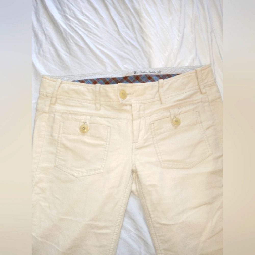 LOW WAISTED FLARED CREAM COLORED PANTS